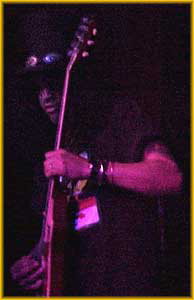 SLASH In A Red Spotlight