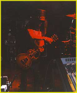 SLASH In A Red Spotlight